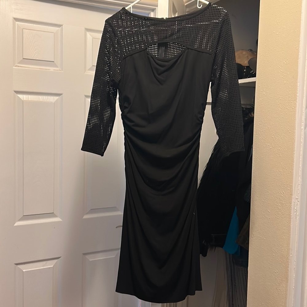 Cache black dress with fishnet like sleeves
